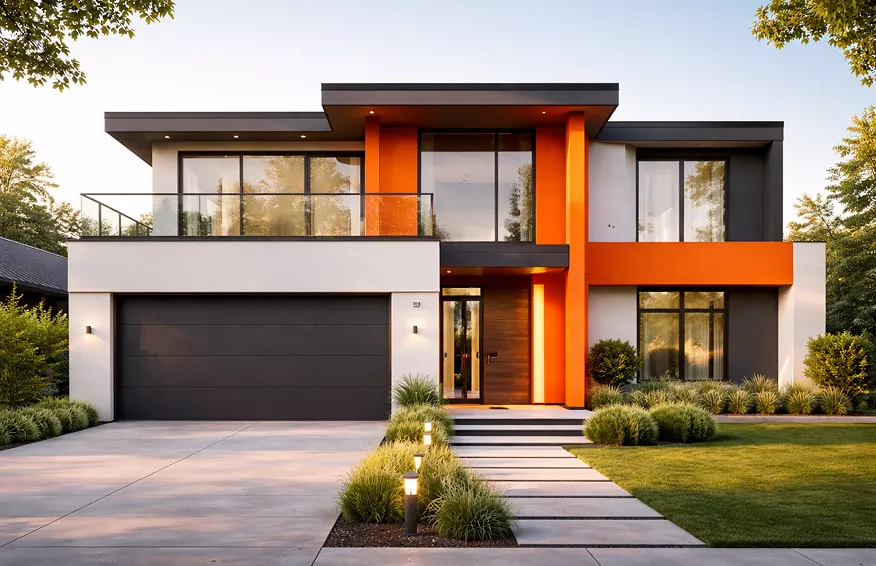 k Modern two-storey home exterior with large glass windows, wood accents, a wide driveway, and lush landscaping at dusk.